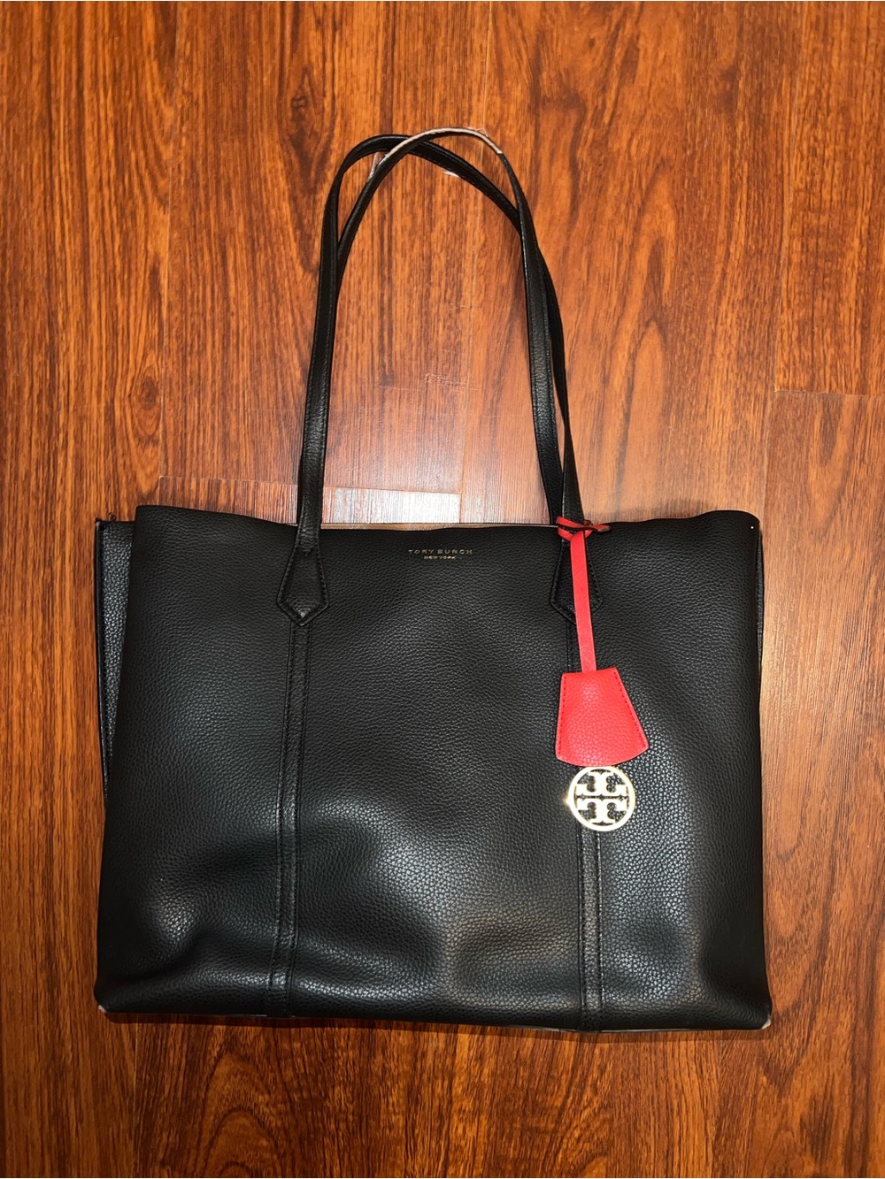 Tory Burch Black Leather Tote with Red Hanging Accent - Picture 2 of 10